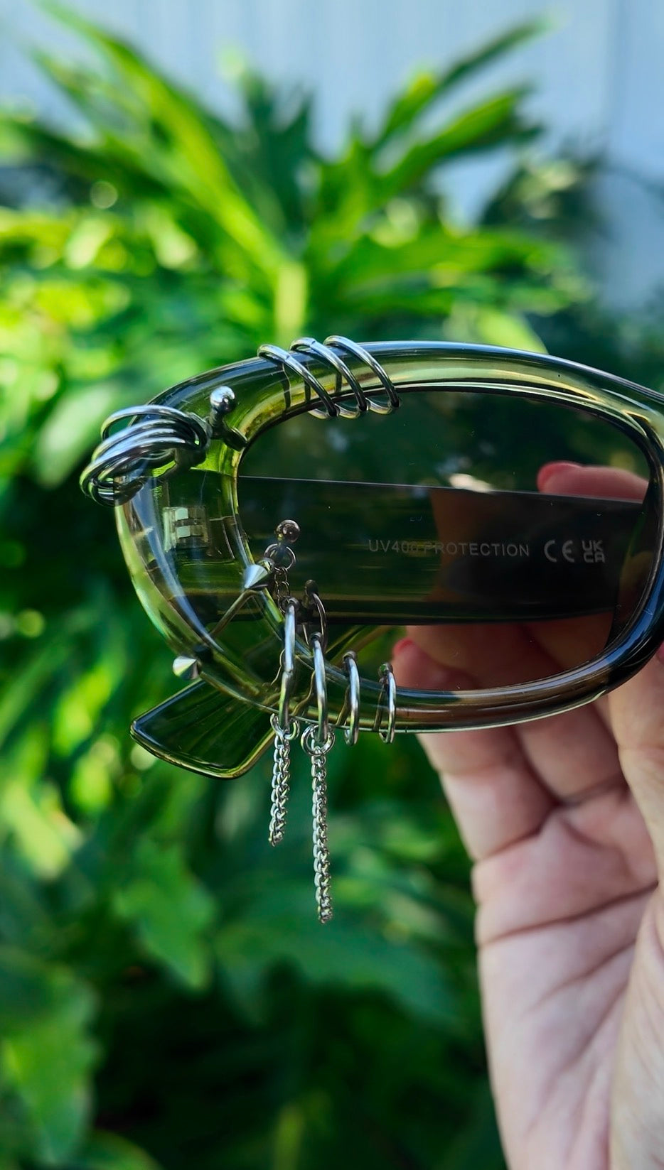 Pierced Up Sunnies: Green Puffy Oval with Silver Piercings