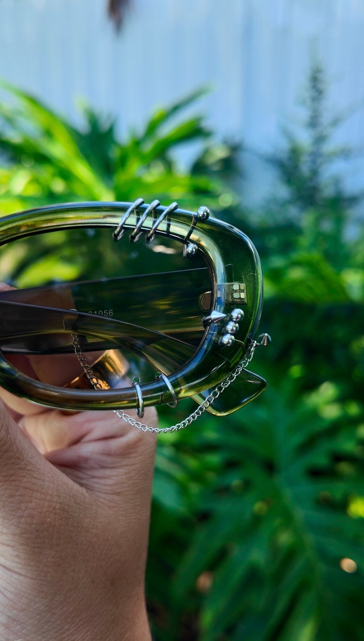 Pierced Up Sunnies: Green Puffy Oval with Silver Piercings