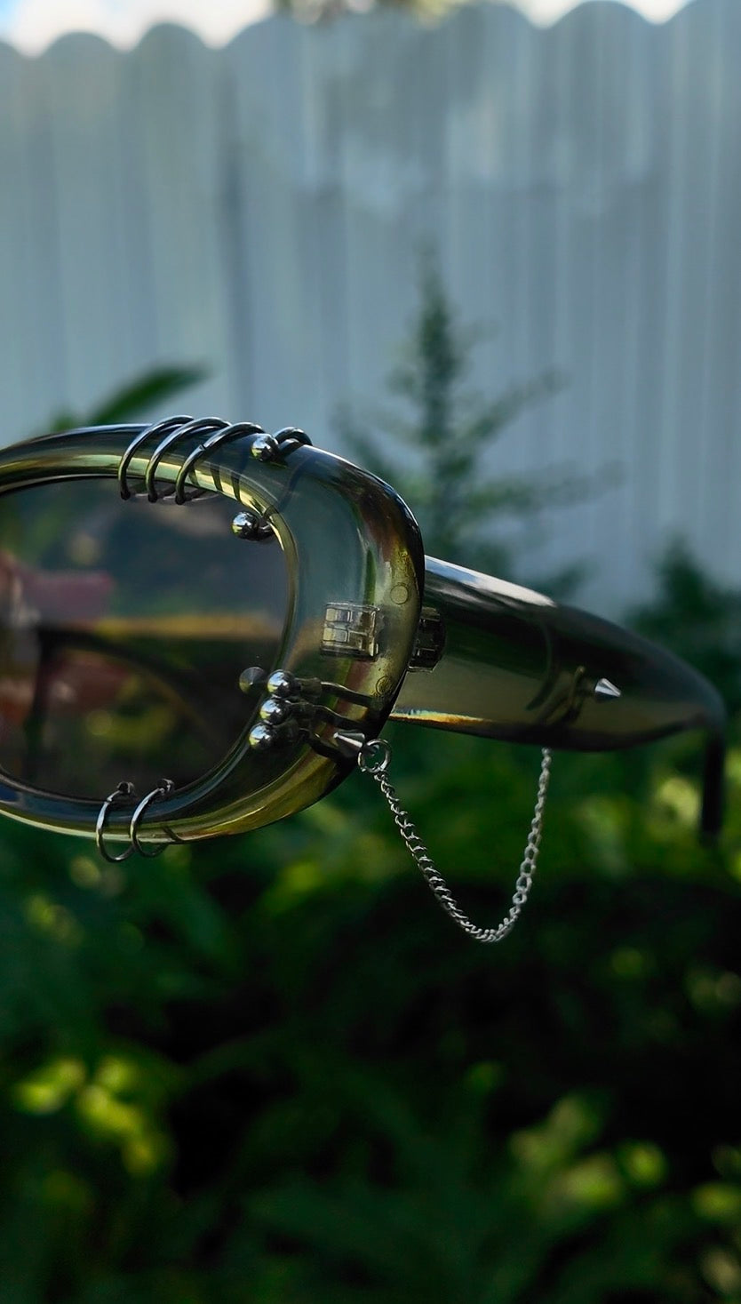 Pierced Up Sunnies: Green Puffy Oval with Silver Piercings